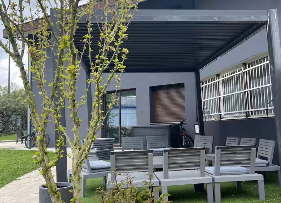 Photo 3 de Maison spacieuse avec jardin, parking et Wi-Fi – proche de la vieille ville