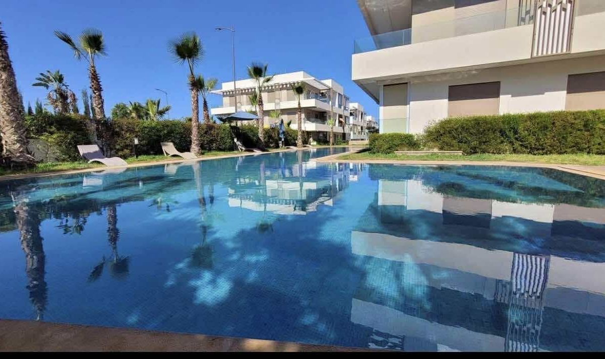 Photo de Bel Appartement T3 avec Terrasse & Piscine – 5 min de la Plage