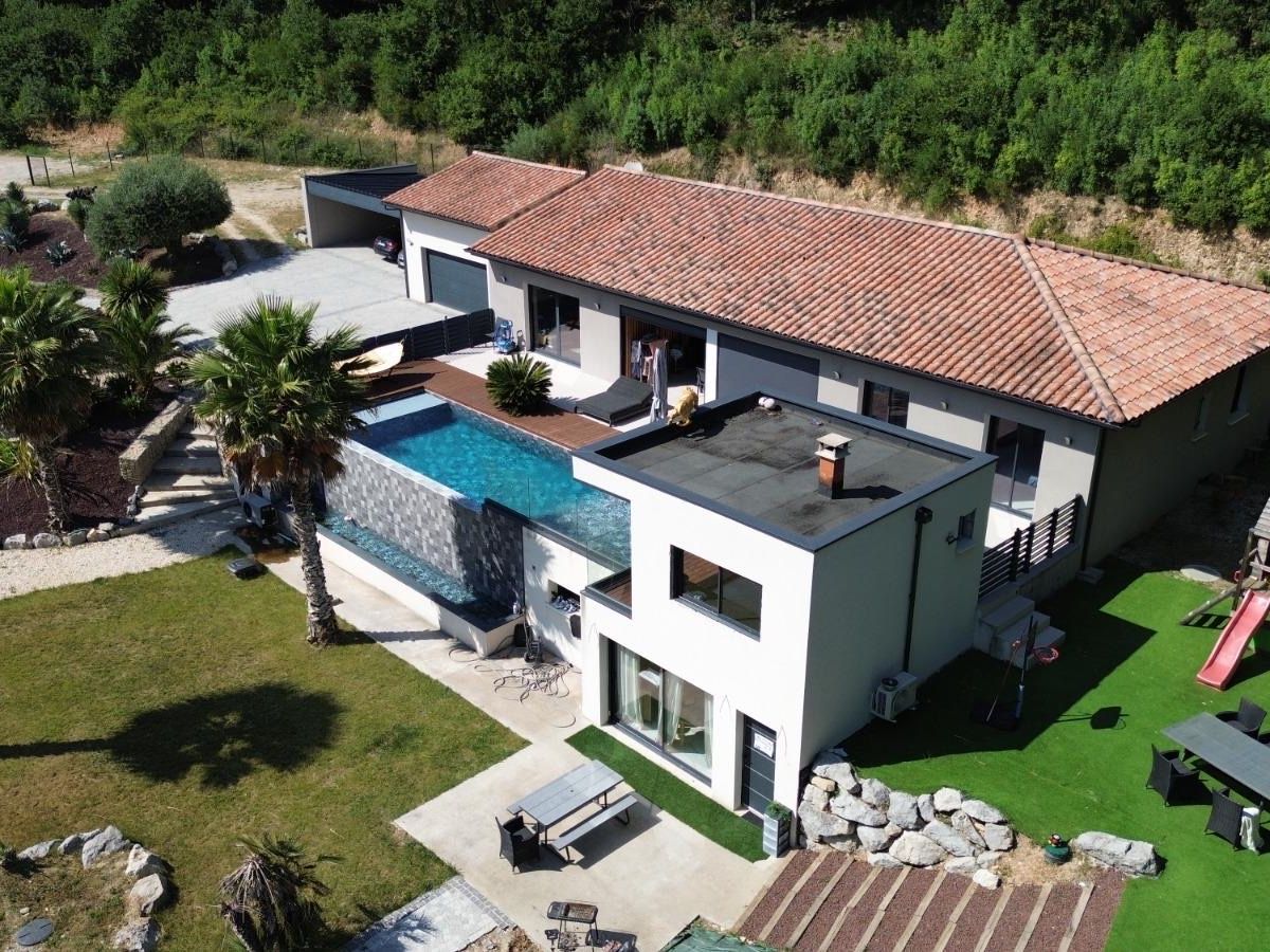 Photo de Maison d’exception en montagne avec piscine à débordement