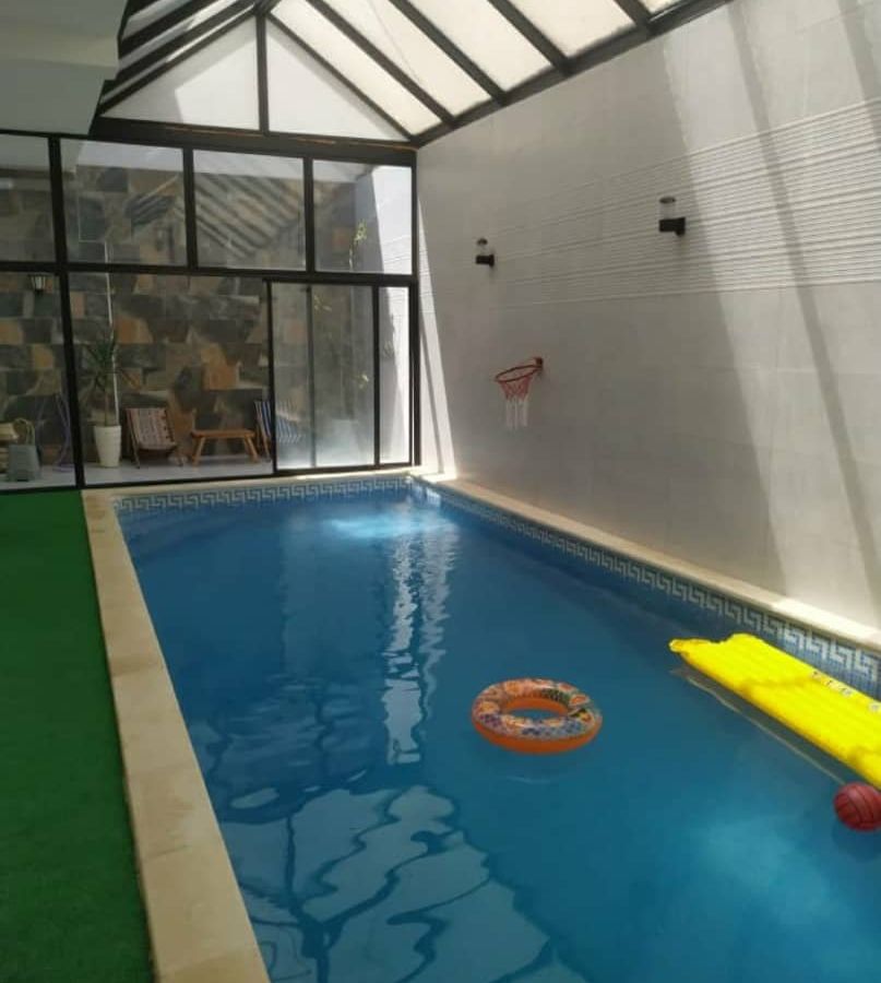 Photo de Niveau de villa F3 +piscines semi couverte et chauffée