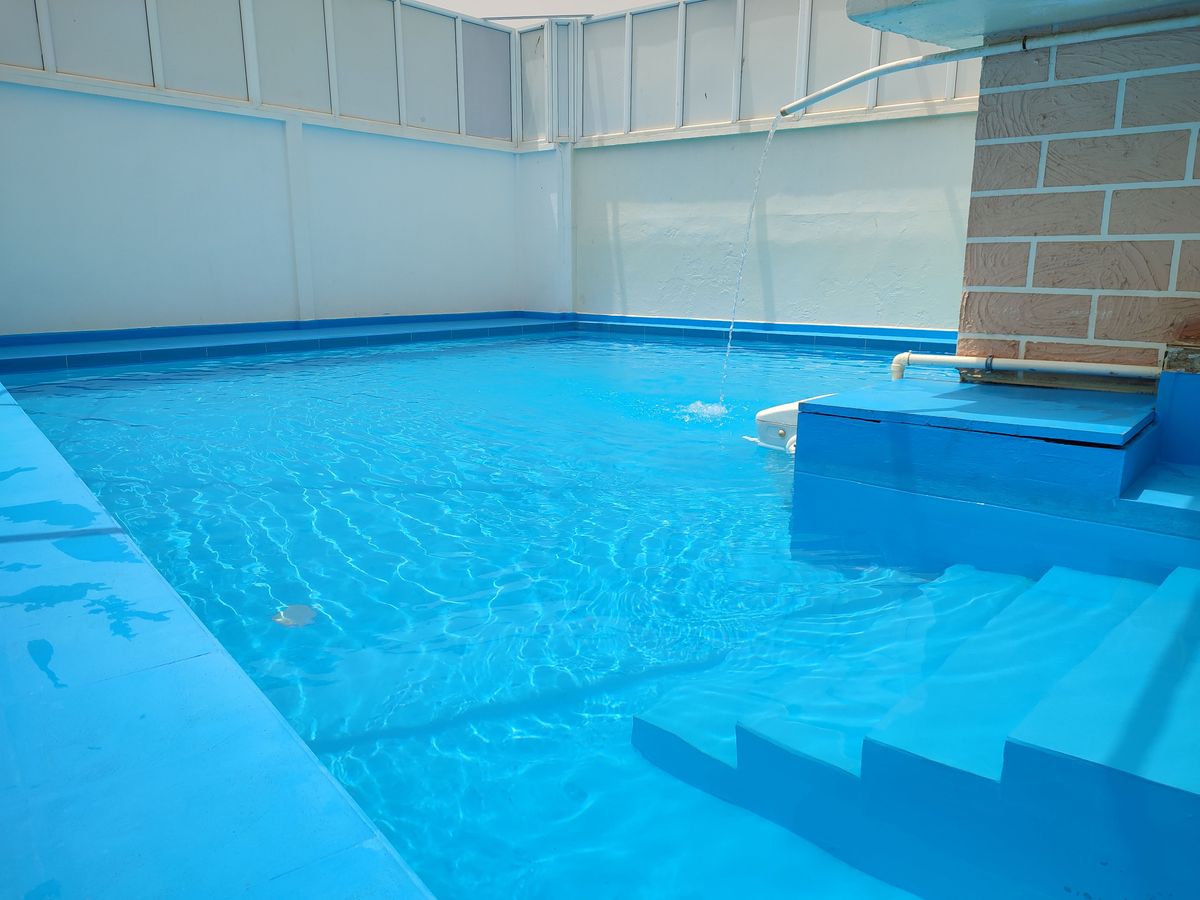Photo de jijel logement avec après midi de piscine 