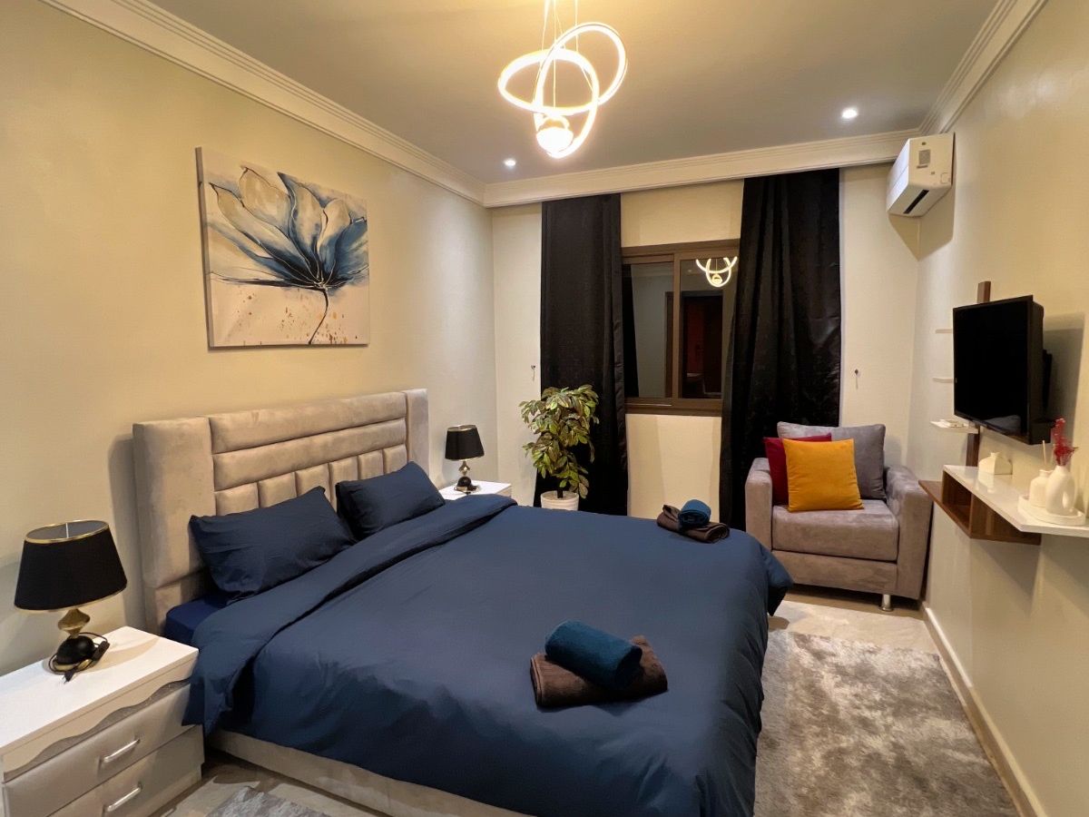 Photo de Cozy Modern Apt | Balcon & Wifi | Centre Gueliz