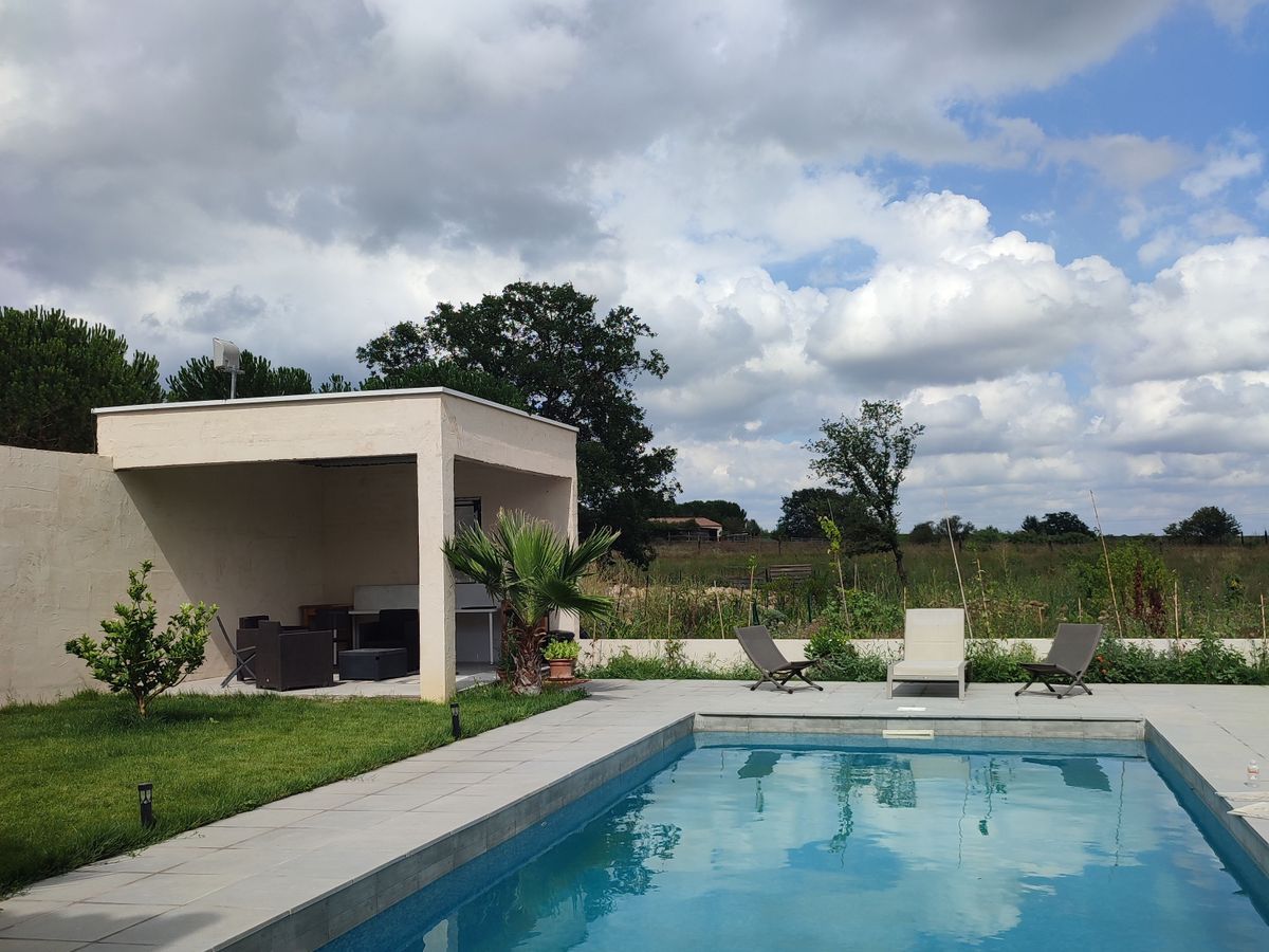 Photo de 🌿🏡 VILLA FAMILIALE AVEC PISCINE PRIVÉE & SALLE DE JEUX – BOISSERON 🏡🌿