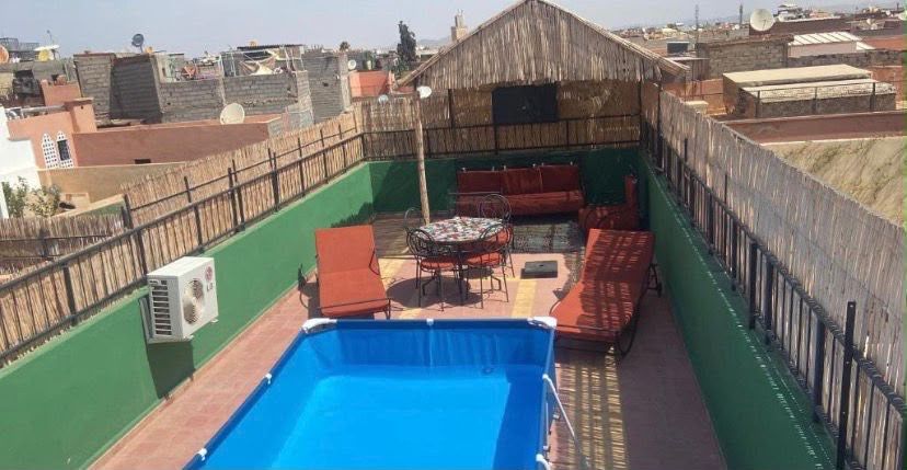 Photo de Appartement cosy avec  terasse commune et petite piscine commune