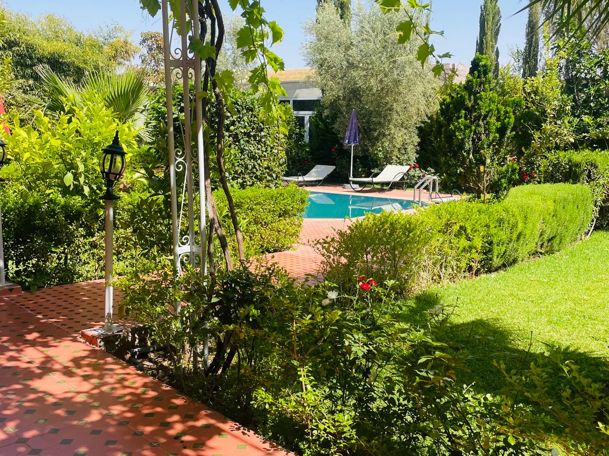 Photo de VILLA LES 3 PALMIERS MARRAKECH PISCINE 